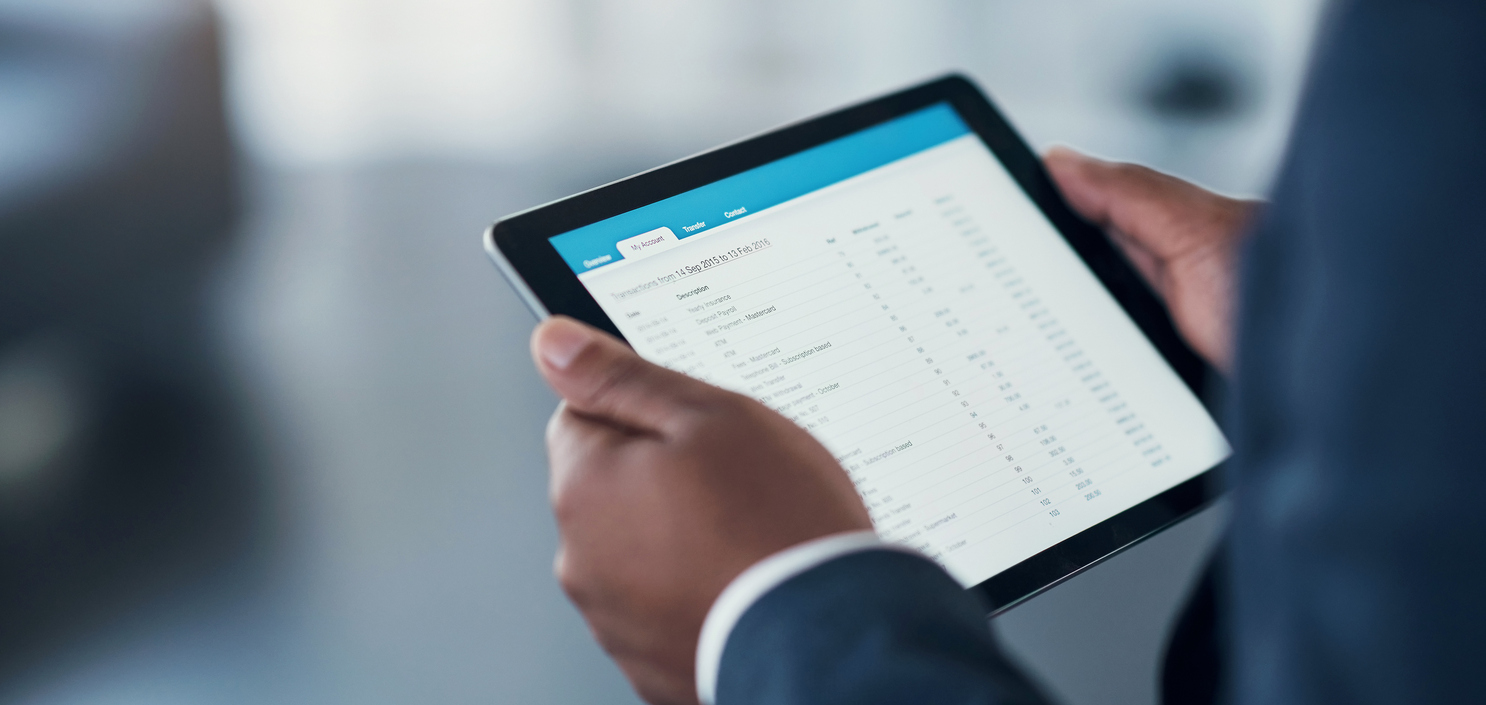 Businessman, hands and tablet in financial accounting, expenses or payment transactions on account at office. Hand of man accountant on technology display in finance planning, strategy or checklist